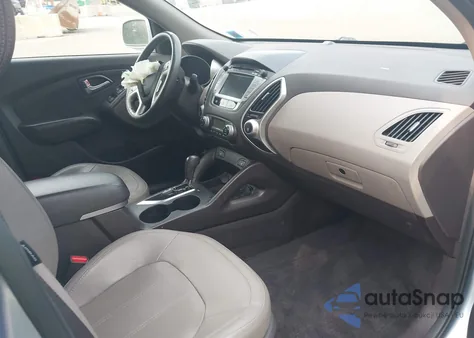 2013 Hyundai Tucson Limited z USA, uszkodzony, nr VIN KM8JUCACXDU597736